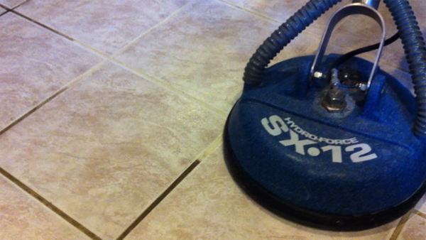 Blue Hydro-Force SX-12 hard surface cleaning tool after cleaning tile
